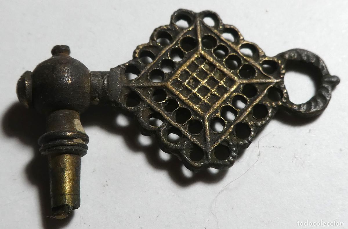 Orologi da taschino: Llave antigua de reloj de bolsillo con cabeza de filigrana