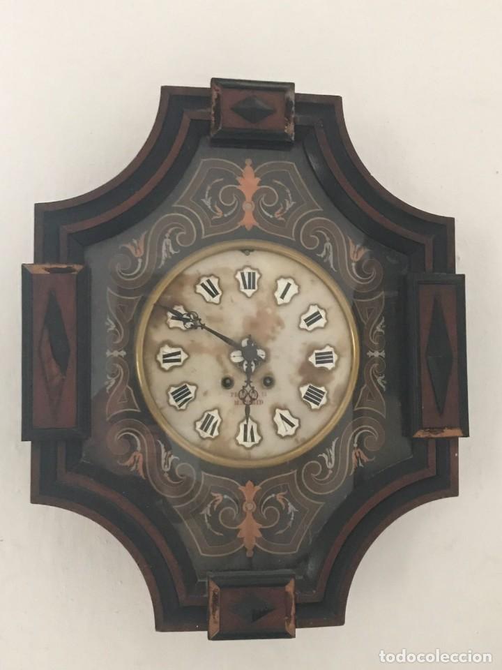 reloj antiguo de pared