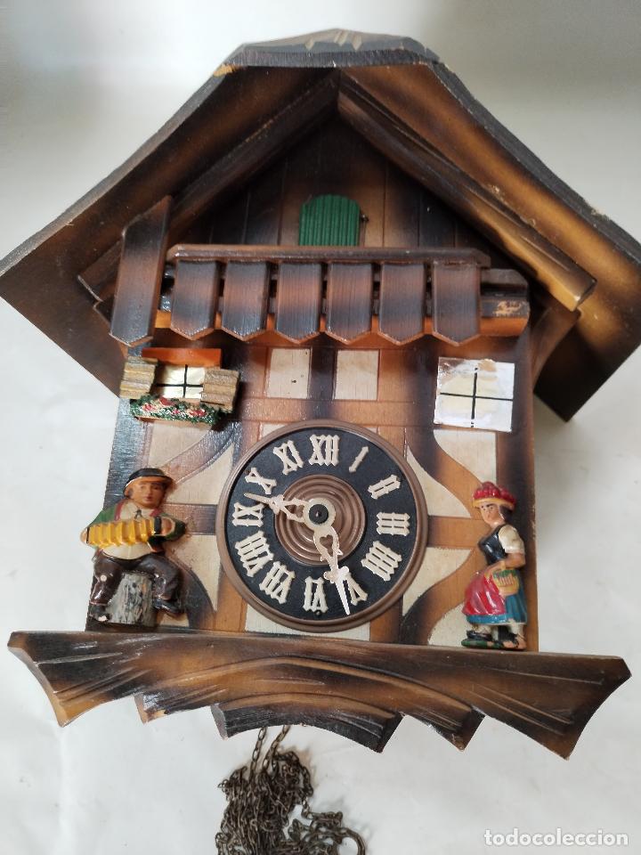 reloj cuco en madera tallada - Compra venta en todocoleccion