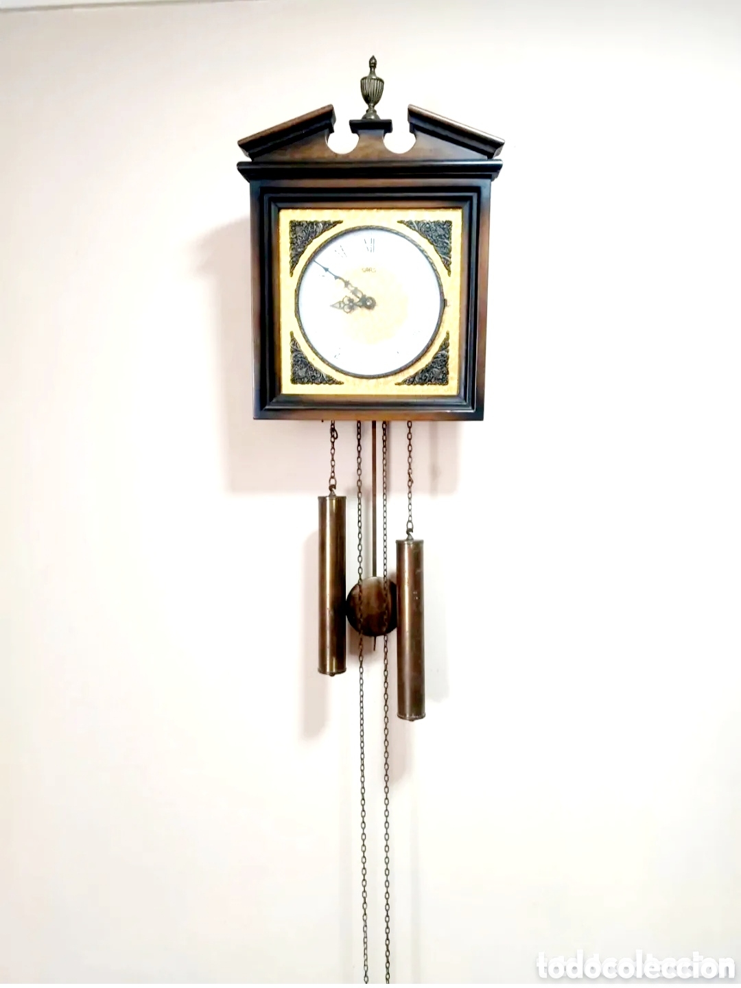 Reloj de pared de péndulo marca SARS de máquina moderna y sonería.
