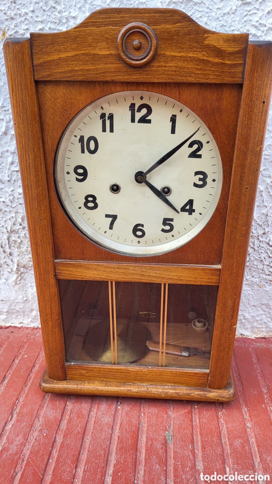 Relojes de pared: Antiguo reloj pared carga manual