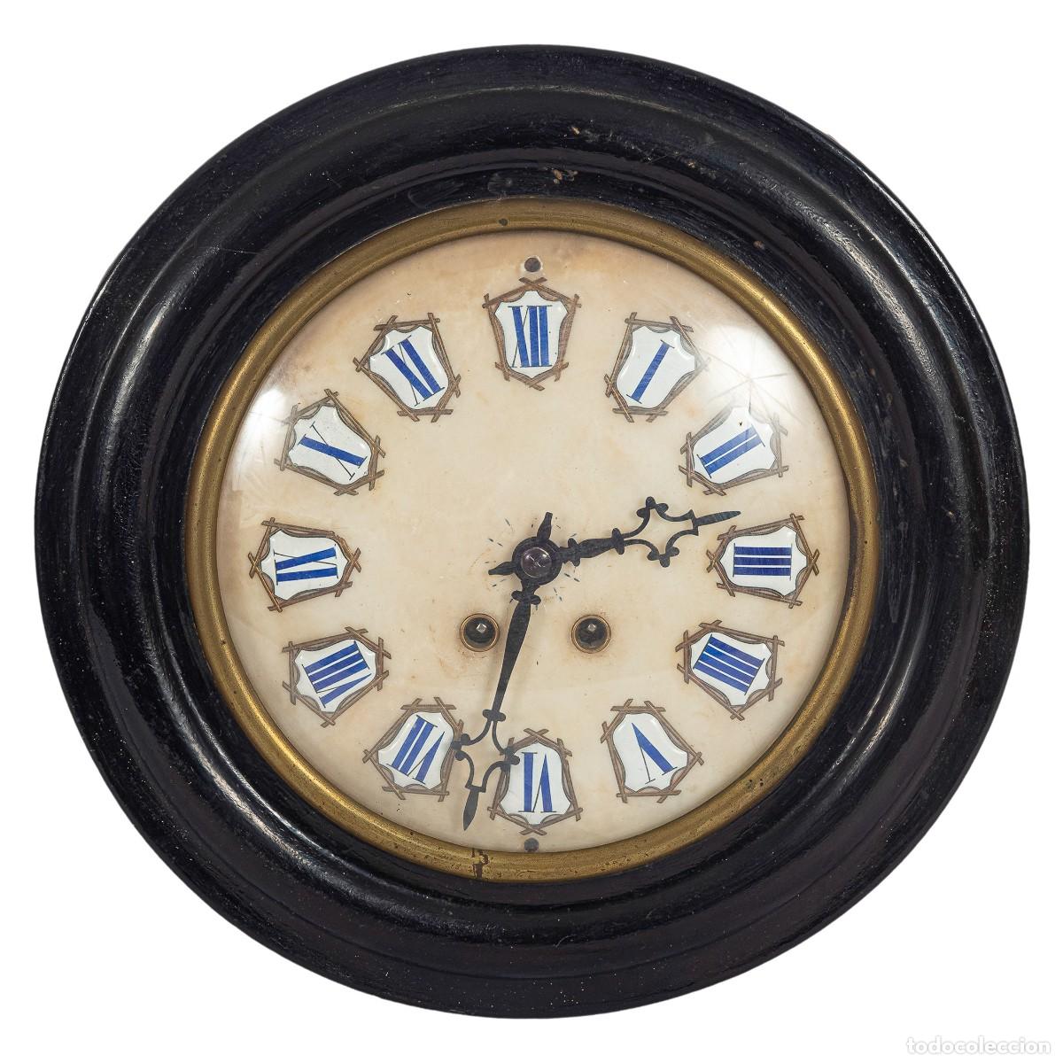 Horloges murales: Reloj isabelino ojo de buey del siglo XIX.