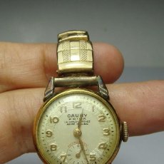 Relojes de pulsera: RELOJ DE PULSERA. CAUNY - 15 RUBÍS - ANTIMAGNETIC. BAÑO DE ORO LA CAJA Y LA CORREA. FUNCIONA.
