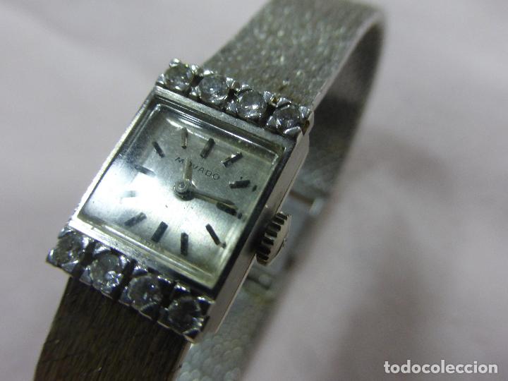 reloj movado con diamantes