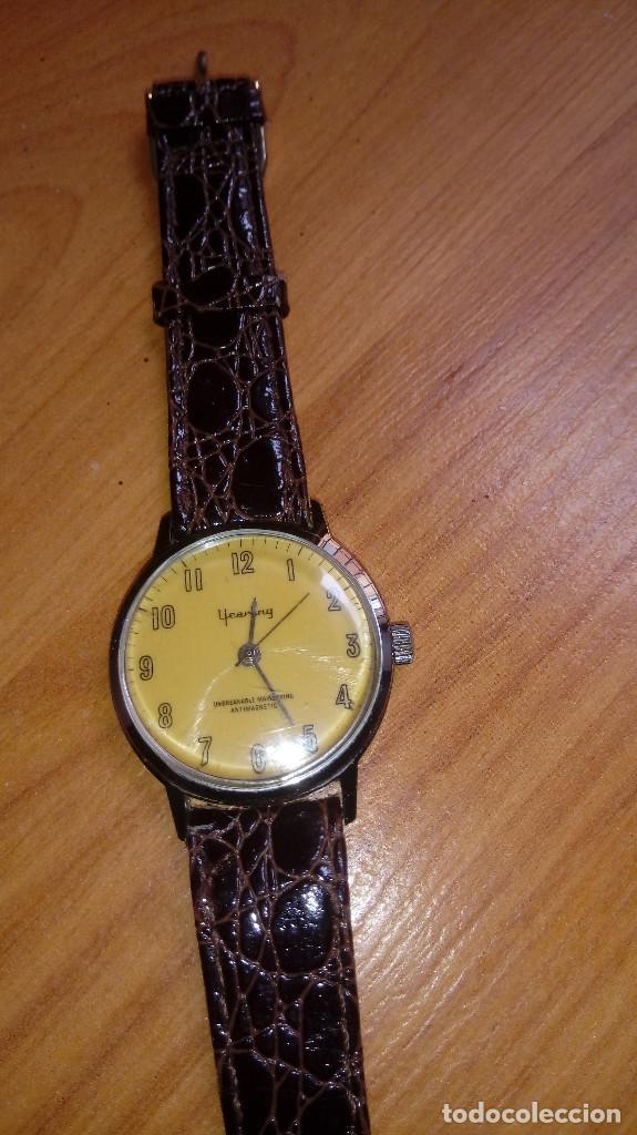 Relojes de pulsera: RELOJ AÑOS 70 CARGA MANUAL FUNCIONA PERFECTAMENTE MARCA YEARLING ESFERA AMARILLA - Foto 1 - 238319545