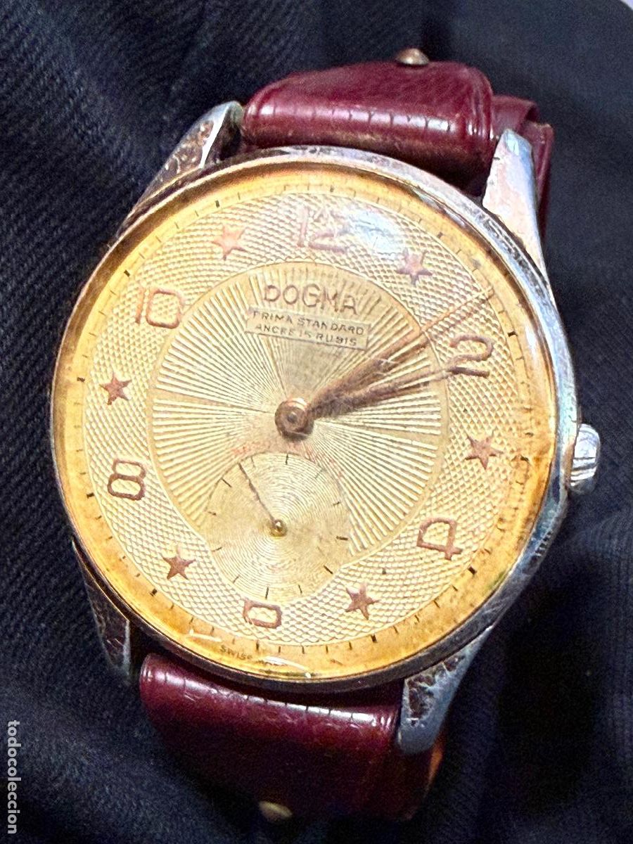 Relojes de pulsera: Antiguo reloj de pulsera DOGMA PRIMA mide unos 4cms FUNCIONA