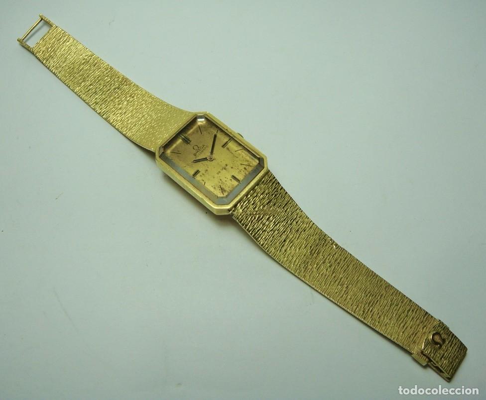 Relojes de pulsera: Omega De Ville autom&aacute;tico &bull; Oro 18K macizo (55 gr de oro)&bull; Brazalete integrado &bull; ca. 1970&ndash;1975