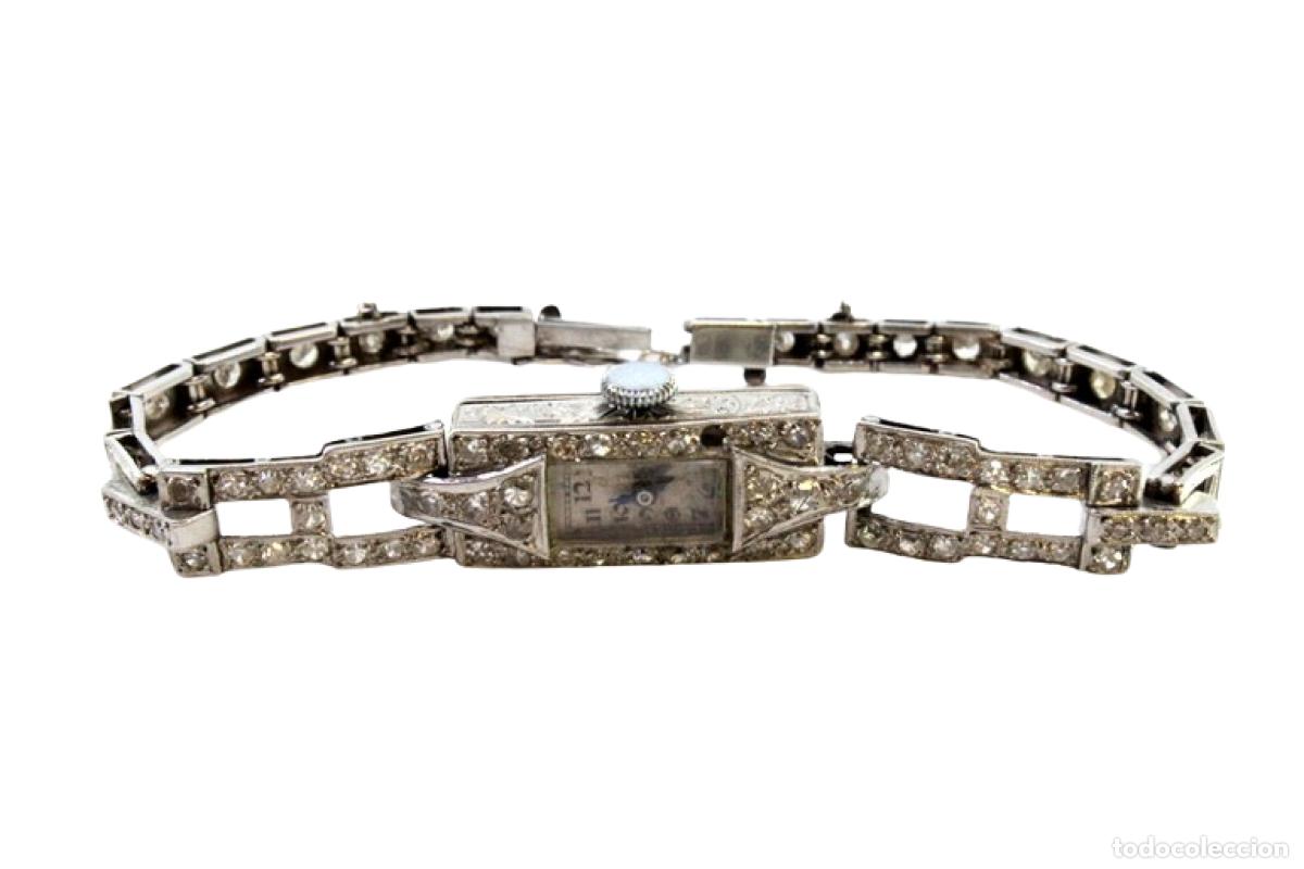 Armbanduhren: Reloj de pulsera de platino con diamantes.