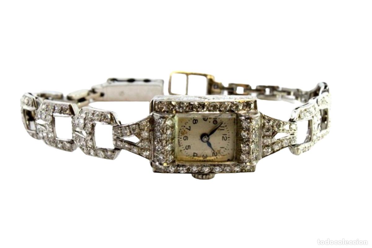Armbanduhren: Reloj de pulsera de platino con diamantes.