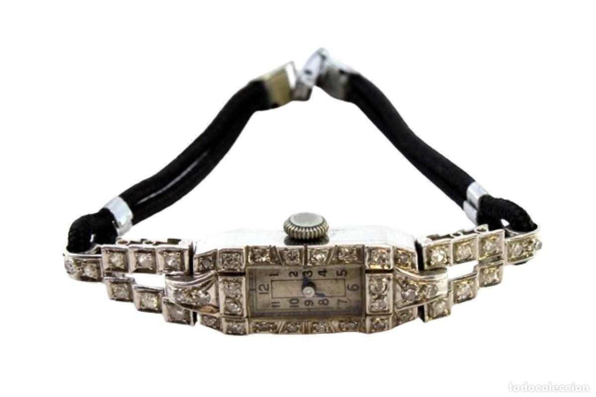 Armbanduhren: Reloj de pulsera de platino con diamantes.