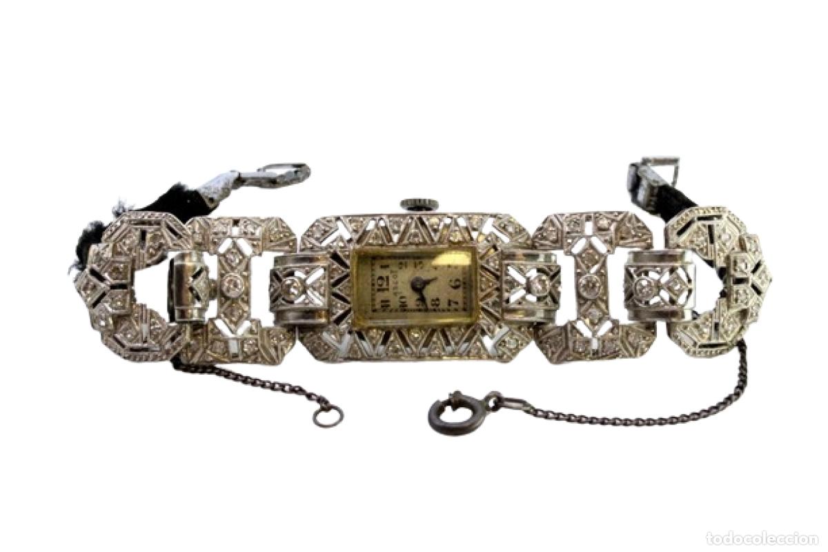 Armbanduhren: Reloj de pulsera de platino con diamantes.