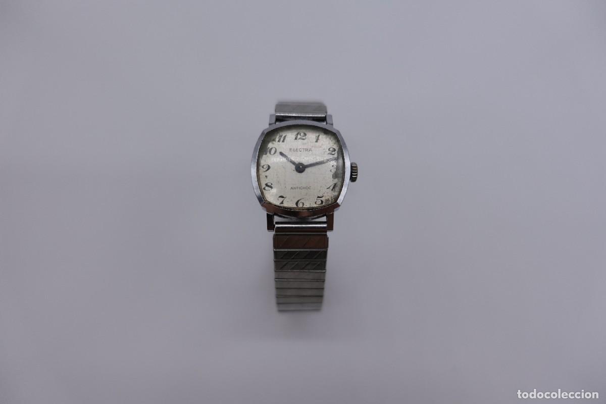 Relojes de pulsera: RELOJ ELECTRA ANTICHOC DE CARGA MANUAL VINTAGE CORREA ELASTICA CUERDA