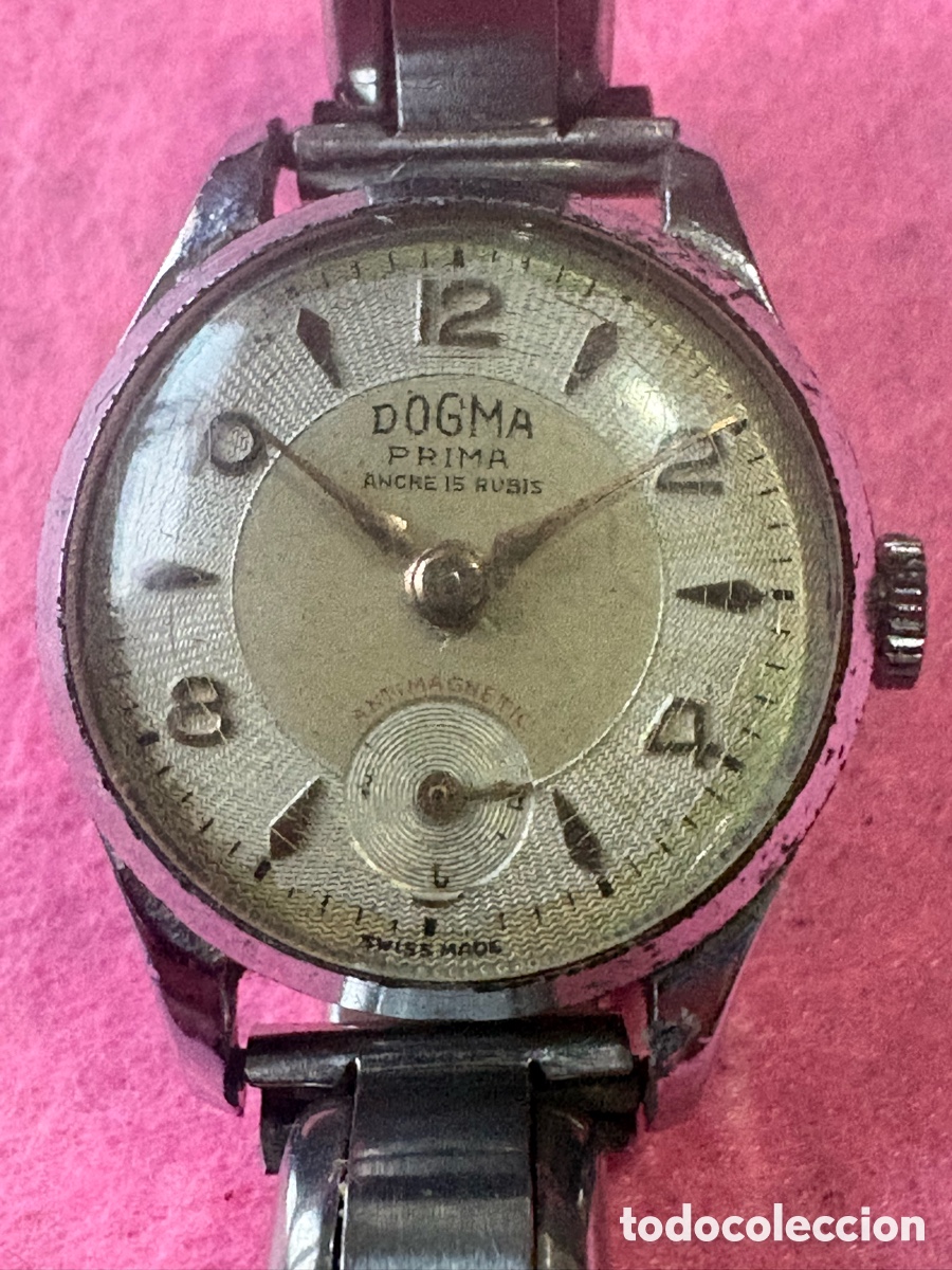 Relojes de pulsera: Antiguo reloj de cuerda Dogma para mujer, esfera bicolor (A1)
