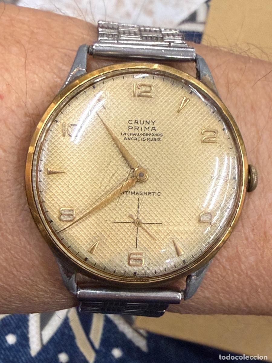 Relojes de pulsera: CAUNY PRIMA, LA CHAUX DE FONDS,, Funciona. Antiguo reloj Vintage. Leer descripcion completa.