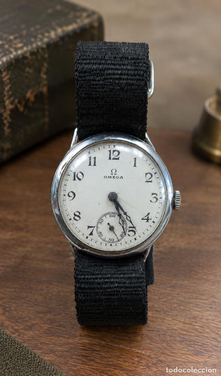 Montres-bracelets: Fant&aacute;stico reloj de transicion y trinchera OMEGA correa de tela.