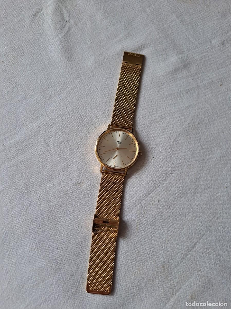 Relojes - Casio: Reloj Casio LTP-E148MG-7A con correa malla milanesa dorada y cristal de zafiro resistente a ara&ntilde;azos