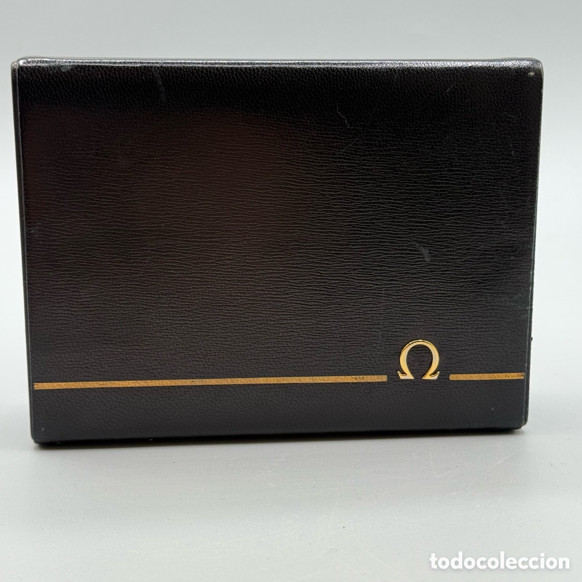 Relojes - Omega: Caja estuche de Loewe para reloj Omega. Interior madera y terciopelo rojo. 14x10,5x4 cms aprox