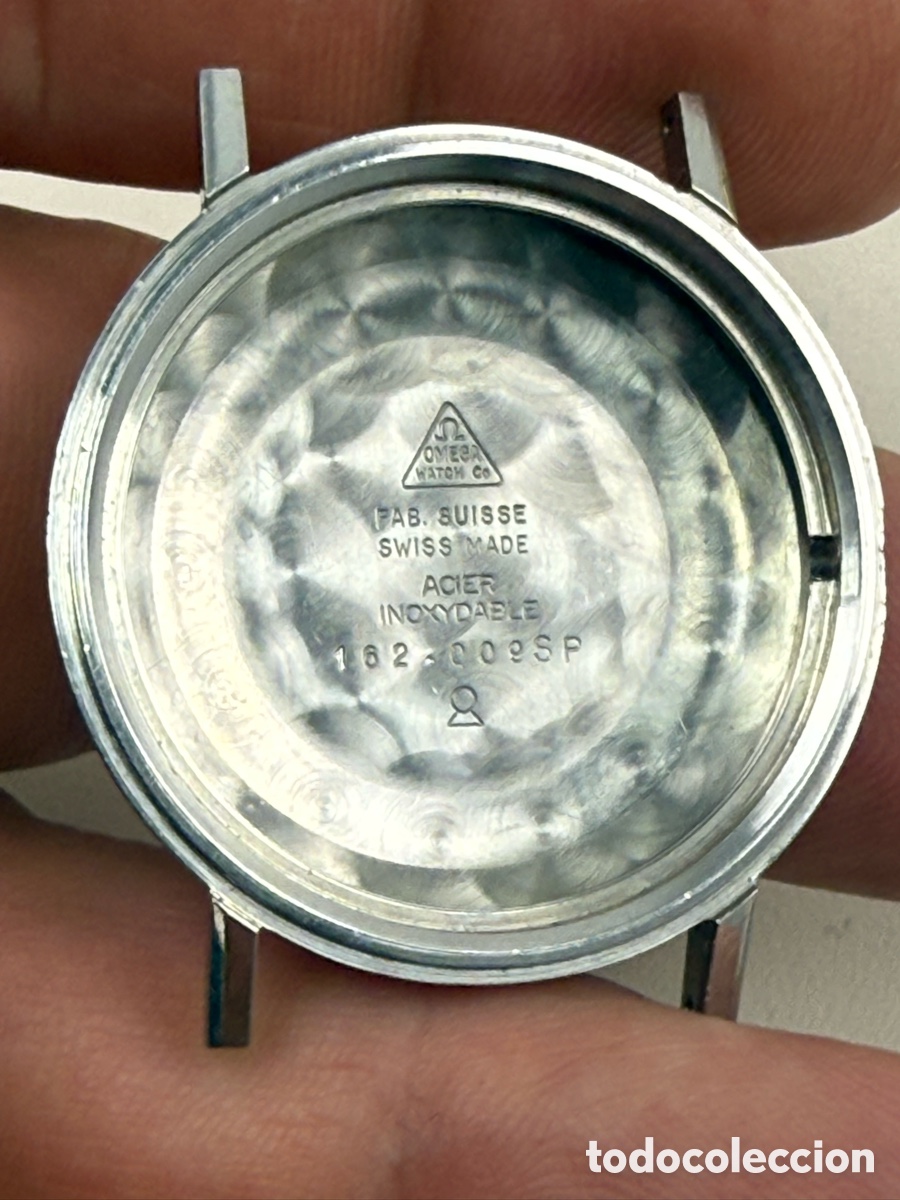 Relojes - Omega: Omega. Ref 162.009 SP. Caja de reloj de pulsera y tapa trasera.