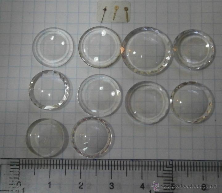 Ricambi di orologi: Lote de 49 cristales de reloj y 3 saetas de reloj miniatura.