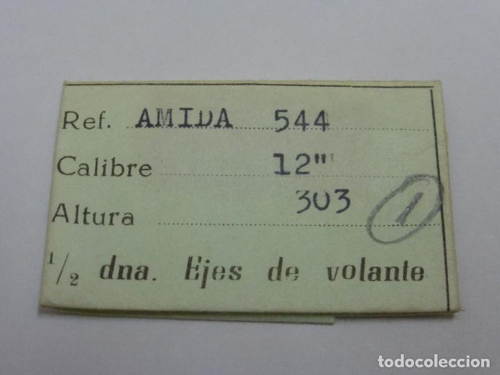 Recambios de relojes: Amida 544, un eje de volante - Foto 1
