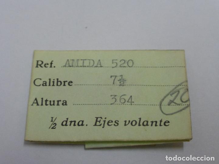 Recambios de relojes: Amida 520, dos ejes de volante - Foto 1