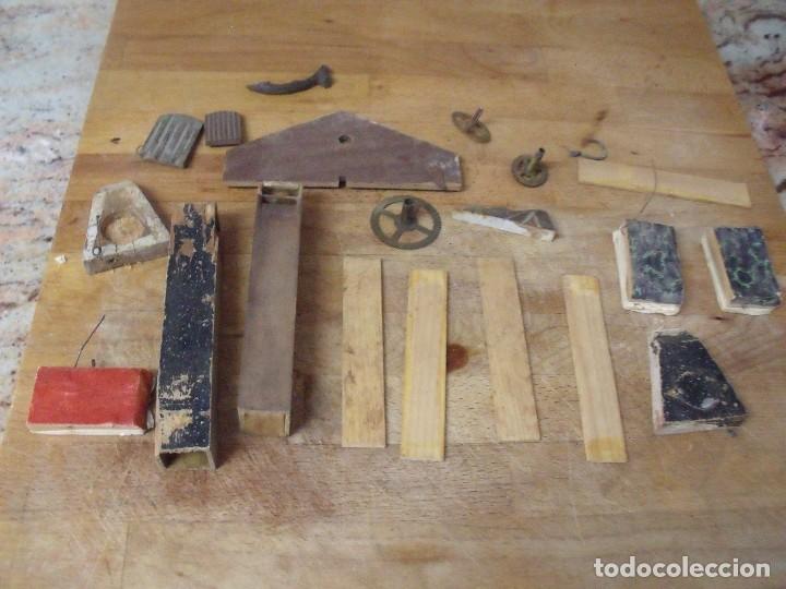 Ersatzteile f&uuml;r Uhren: 21 piezas para reparacion de cucos- lote 163