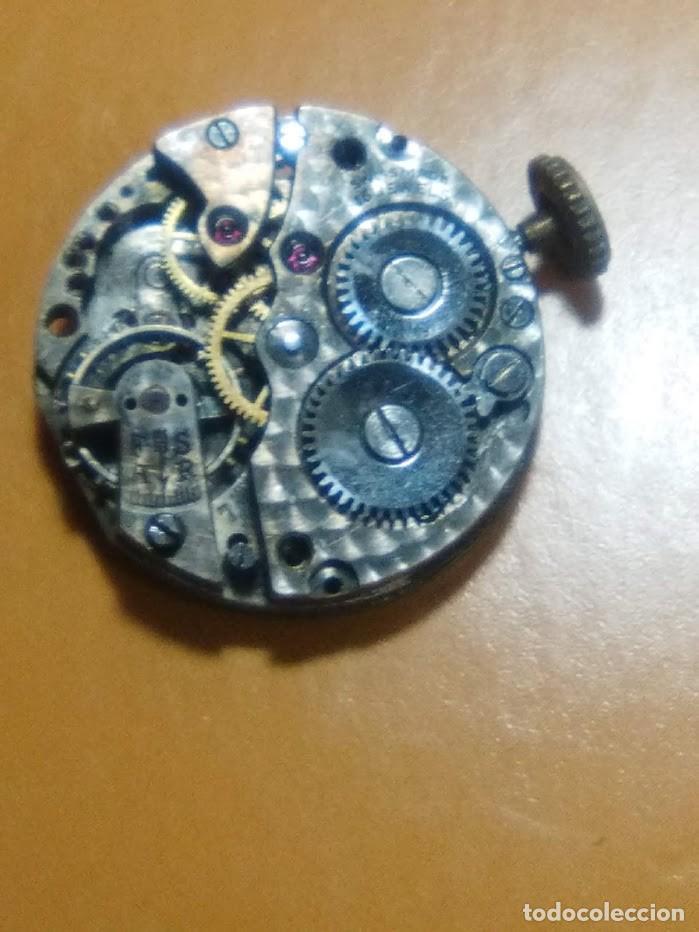 Recambios de relojes: L - Ref. ? - para recambios ( volante bien / el puente no completo )(2 fotos)
