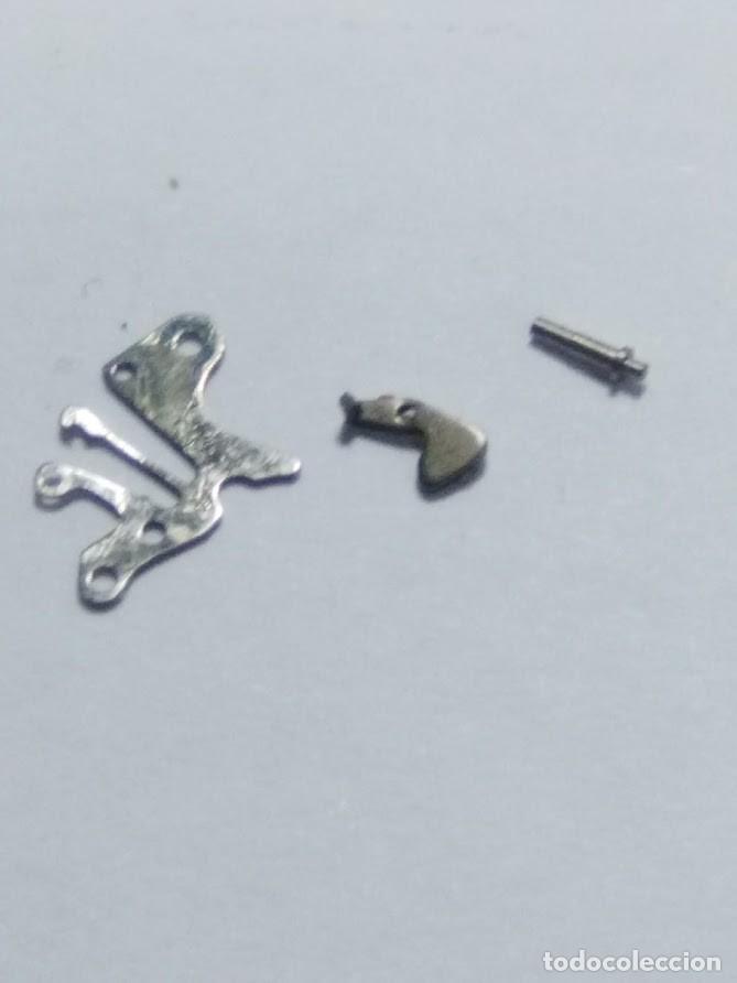 Pe&ccedil;as de reposi&ccedil;&atilde;o de rel&oacute;gios: Seiko 11 A - pza - 445 + tireta y tornillo (cd.- DP)