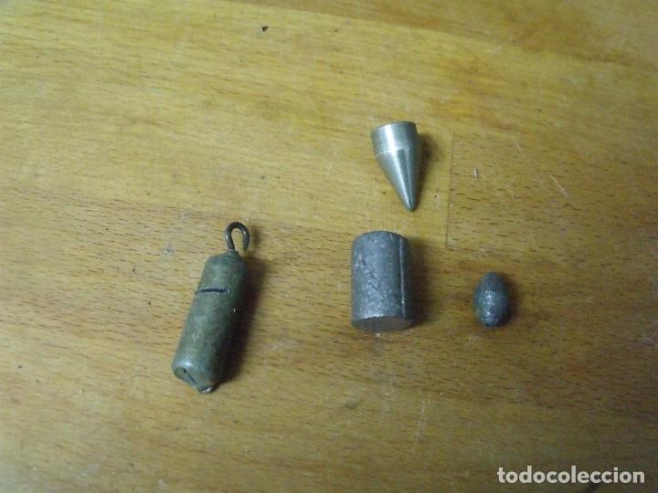 Pe&ccedil;as de reposi&ccedil;&atilde;o de rel&oacute;gios: 4 plomos para lastrar pendulos- lote 310