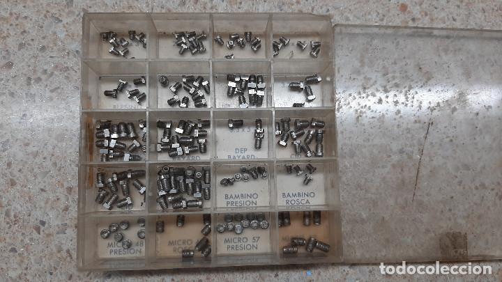 Recambios de relojes: CAJA DE TORNILLOS VOLANTE PARA DESPERTADOR DE VARIOS PASOS-CALIBRES * NUEVOS * REPUESTOS RELOJERO.