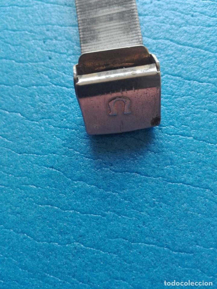 desgastado reloj omega costelletion 