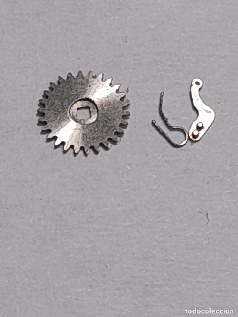 Pe&ccedil;as de reposi&ccedil;&atilde;o de rel&oacute;gios: ETA - 2410 - rochete, trinquete y su muelle - (cd-6988)