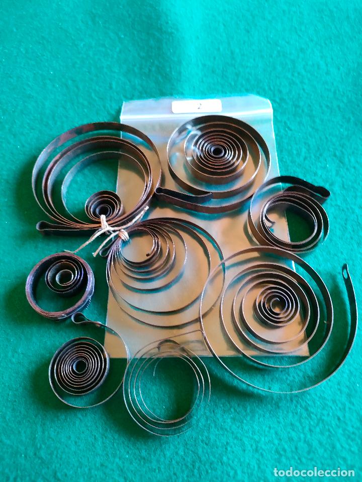 Pe&ccedil;as de reposi&ccedil;&atilde;o de rel&oacute;gios: LOTE DE MUELLES PARA CUERDAS DE RELOJES L-2