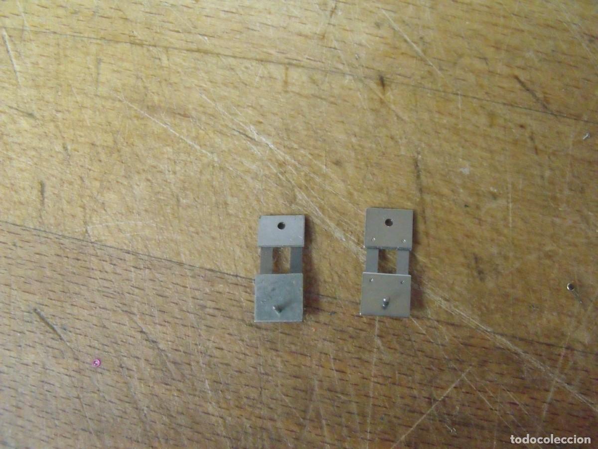 Ersatzteile f&uuml;r Uhren: 2 suspensiones para relojes de pared-8 x 18 mm lote 555