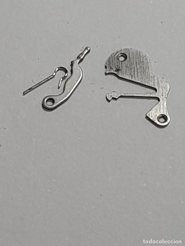 Pe&ccedil;as de reposi&ccedil;&atilde;o de rel&oacute;gios: Arongo 151 - pza. 445 +b&aacute;scula y su muelle - (cd-7029)