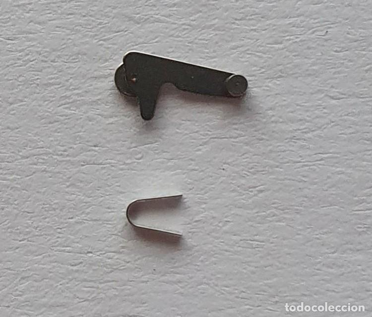 Ersatzteile f&uuml;r Uhren: TRINQUETE Y MUELLE ETA 2408-2390-2450