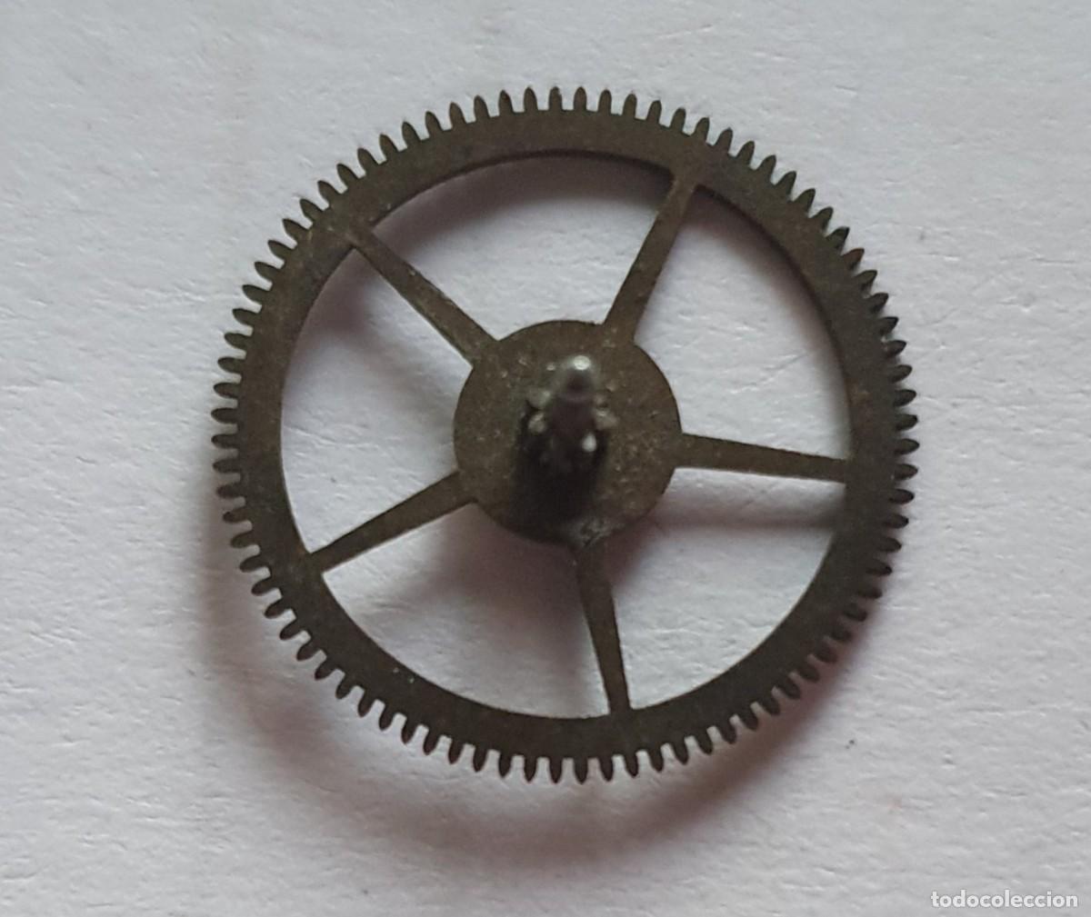 Pi&egrave;ces de rechange de montres et horloges: RUEDA PRIMERA RELOJ VOLSILLO ROSCOPF medidas diametro 12. m altura 5.1/2 m. pi&ntilde;on 1.45 m.