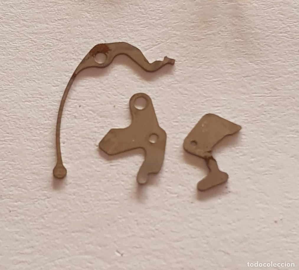 Spare Parts for Watches: MUELLE TIRE ORIENT 48320