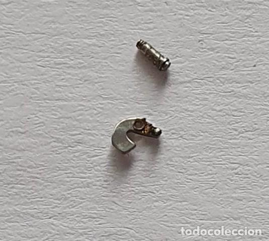 Recambios de relojes: TIRETE Y TORNILLO ETA 2412