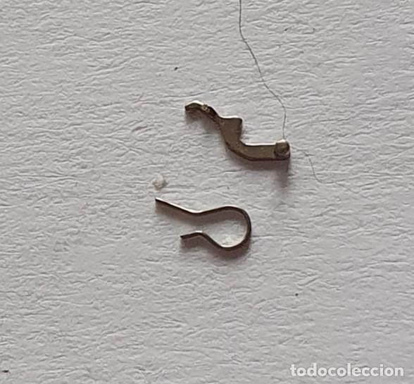 Recambios de relojes: BASCULA Y MUELLE ETA 2412