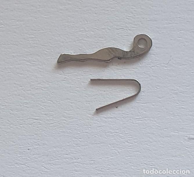 Pi&egrave;ces de rechange de montres et horloges: BASCULA Y MUELLE UT 6425