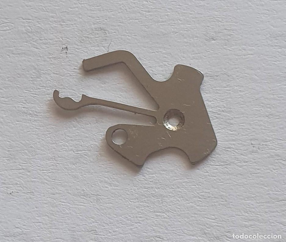 Pi&egrave;ces de rechange de montres et horloges: MUELLE TIRE RELOJ UT 6425