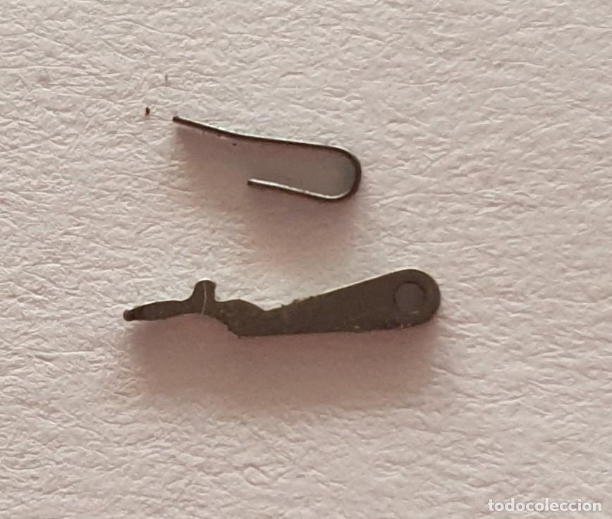 Ersatzteile f&uuml;r Uhren: BASCULA Y MUELLE PESEUX 7040-7060