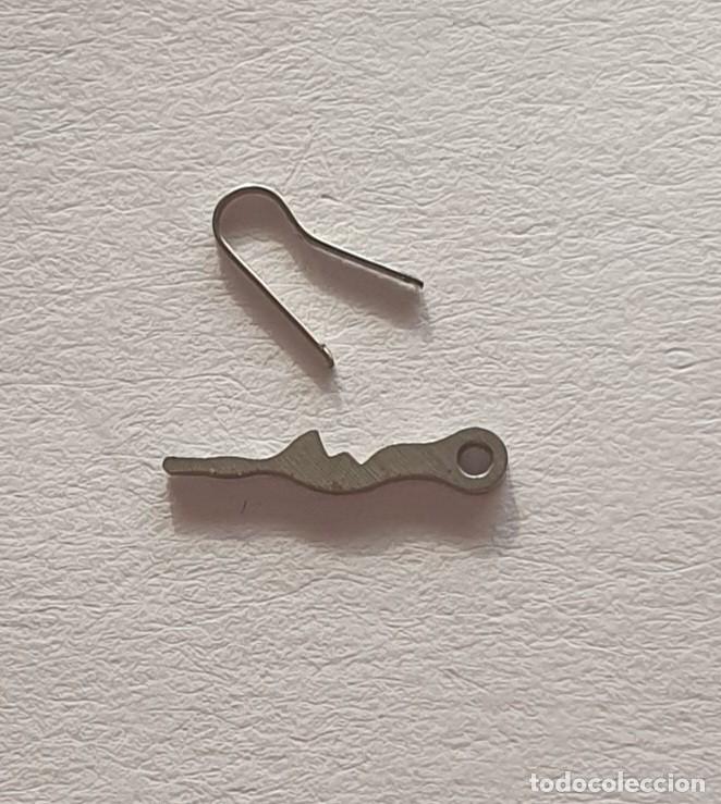 Pi&egrave;ces de rechange de montres et horloges: BASCULA Y MUELLE FELSA 720