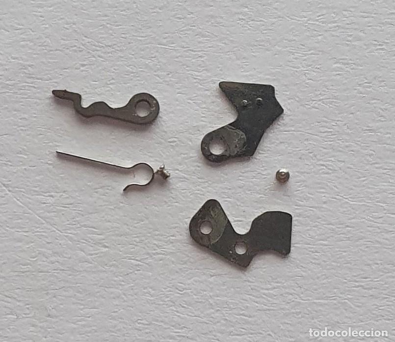 Spare Parts for Watches: BASCULA Y MUELLE ORIENT 49741