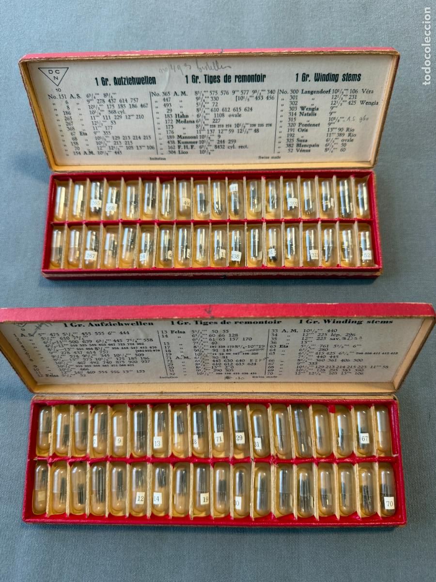 Recambios de relojes: 2 cajas antiguas con repuestos para relojero , ejes , tijas de remontuar . distintos calibres