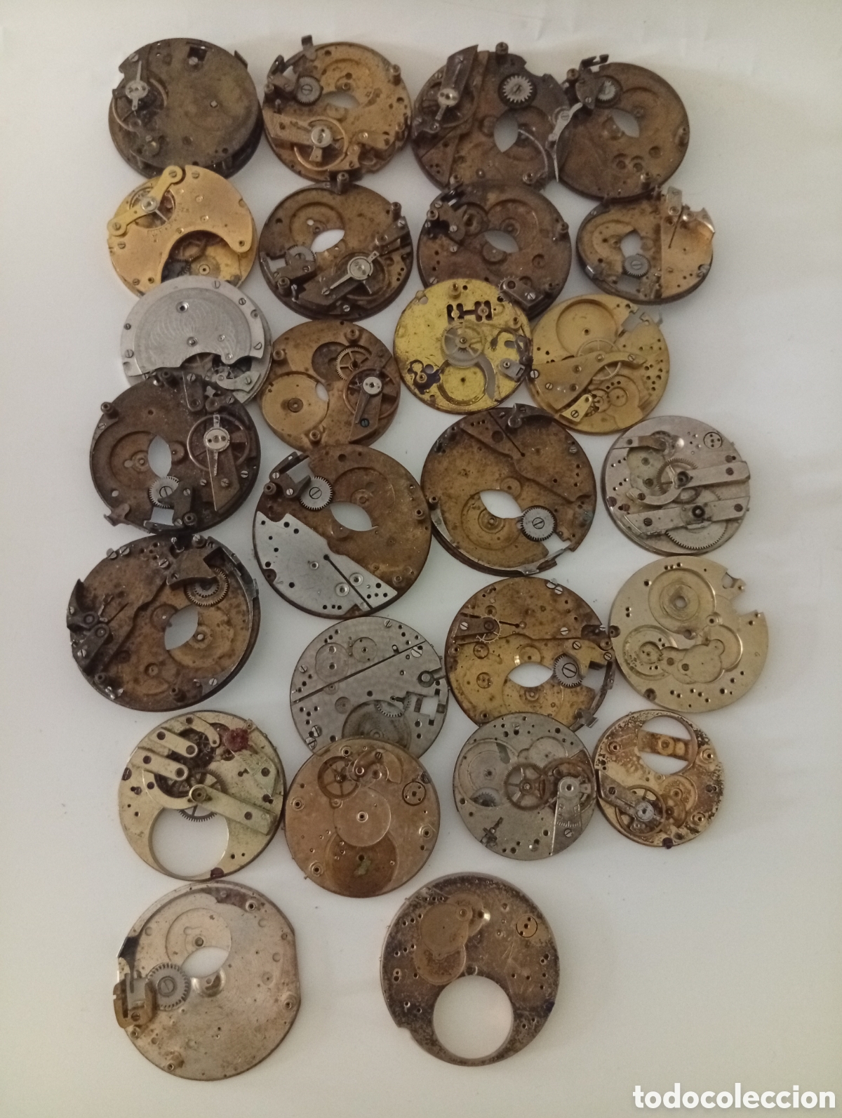 Recambios de relojes: PLATINAS Y MECANISMOS INCOMPLETOS ANTIGUOS PARA RELOJ DE BOLSILLO. 26 RECAMBIOS Y PIEZAS.