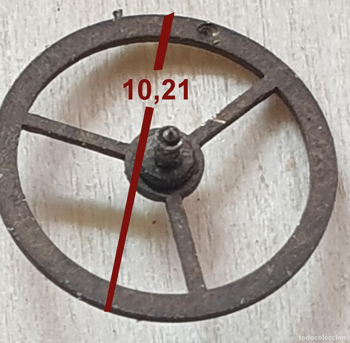 Recambios de relojes: Volante de Reloj Antiguo 10,21 mm con Eje &ndash; Calibre Desconocido &ndash; X
