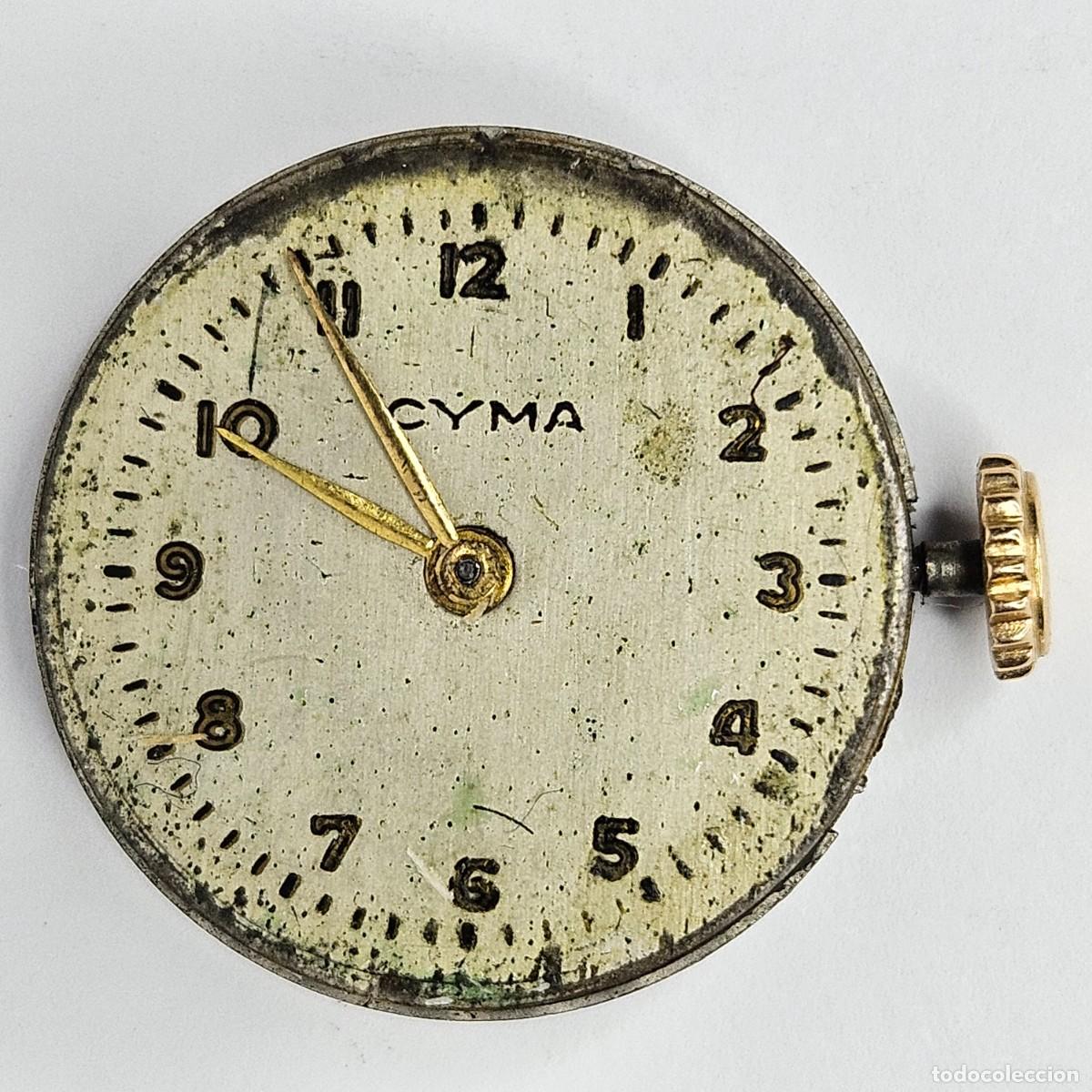 Recambios de relojes: MAQUINARIA RELOJ CYMA-CALIBRE-ESFERA-TIJA-CORONA Y AGUJAS COLOR ORO- A&Ntilde;OS 40-50