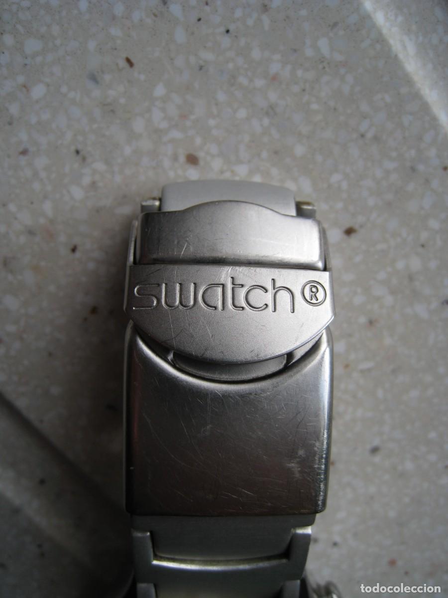 Recambios de relojes: Pulsera para reloj swatch bien conservada con dos eslabones de repuesto